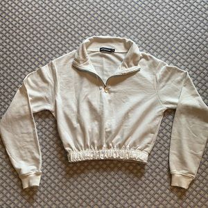 White light quarterzip sweatshirt/top from PrettyLittleThing in size Medium